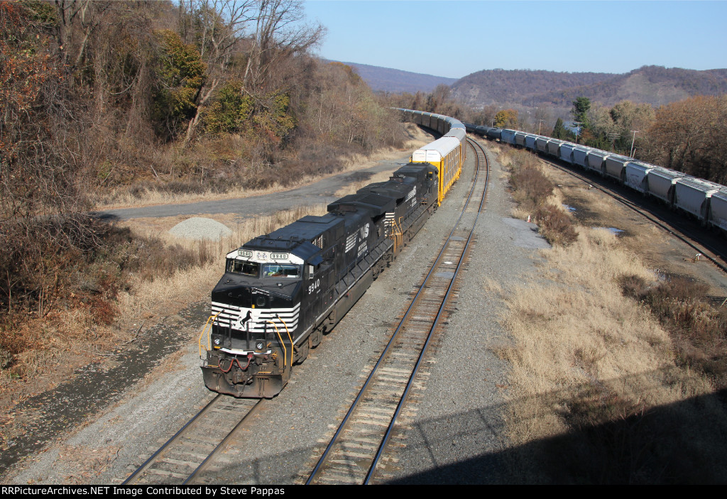 NS 9940 and 9602 bring train 11J into Enola yard